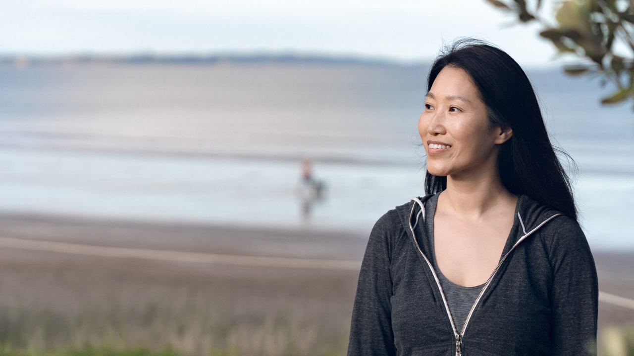 smiling asian girl in the park smiling asian girl in the park