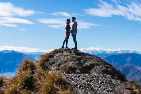 Couple on a mountain summit
