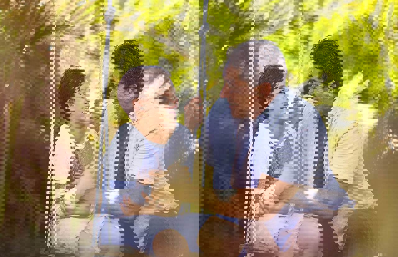 Father smiling at son Father smiling at son