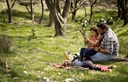 Dad with daughters in the park