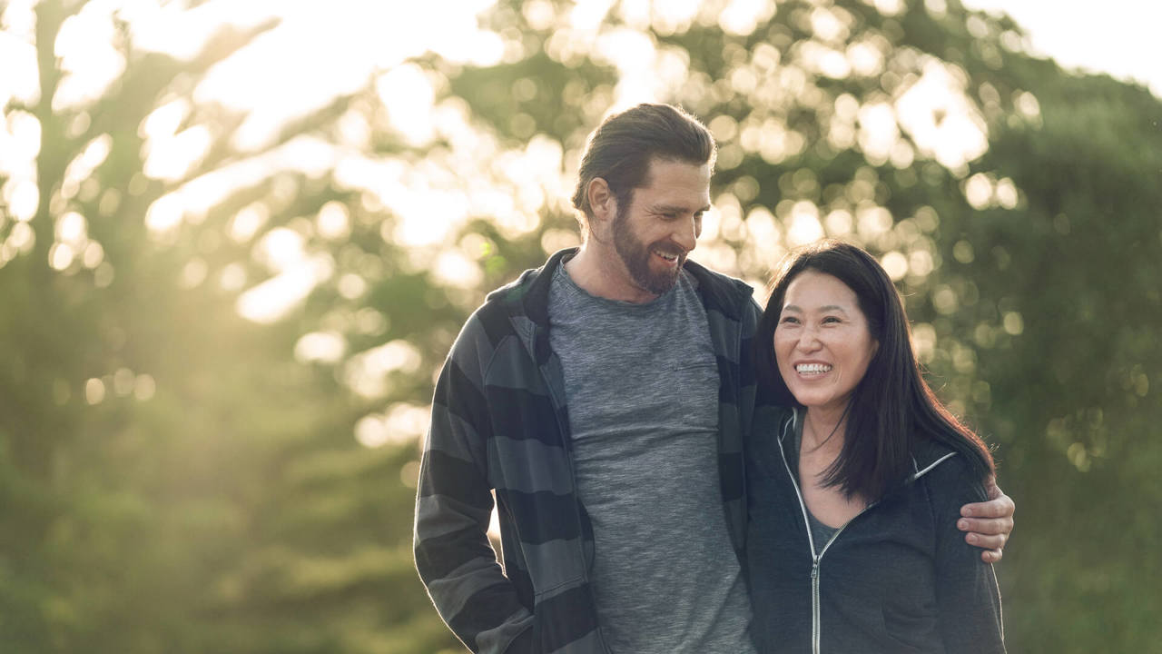 laughing couple in the park
