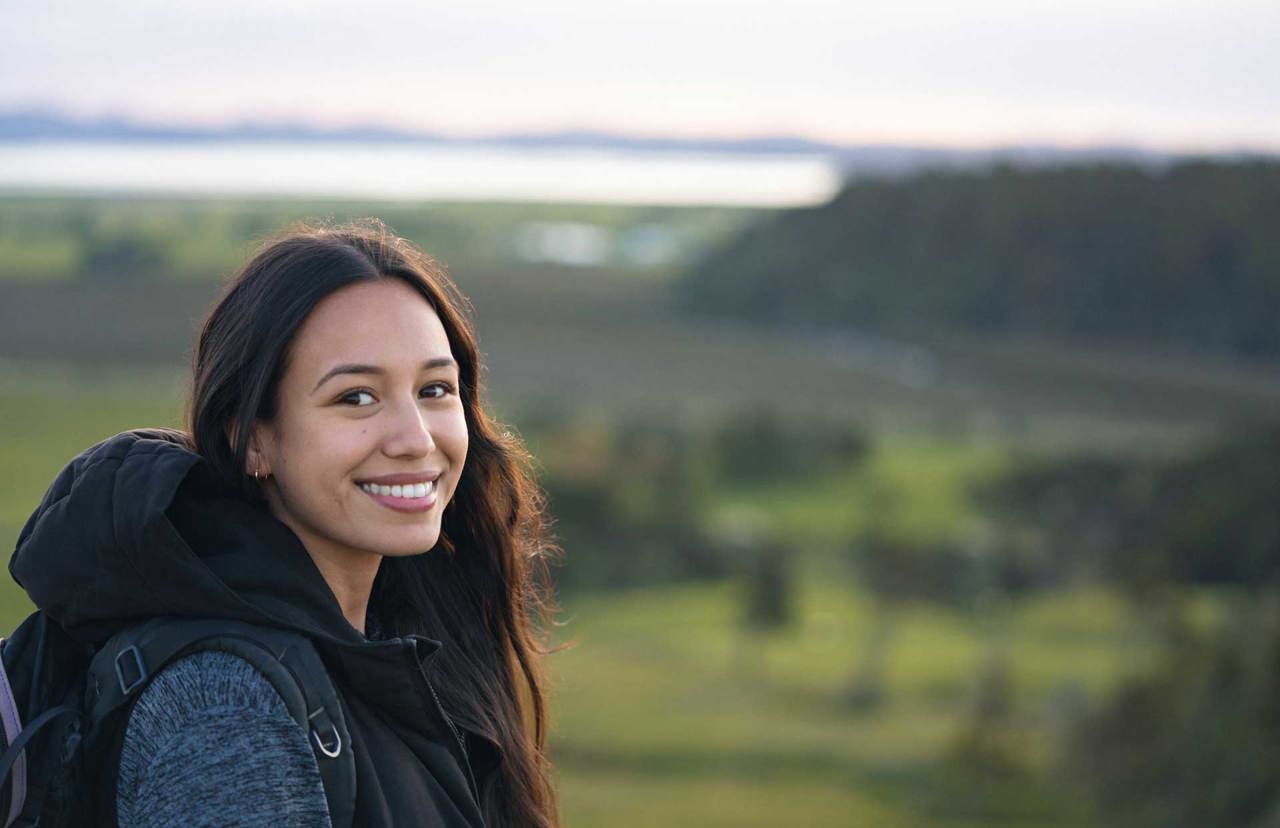 smiling young lady on a picnic