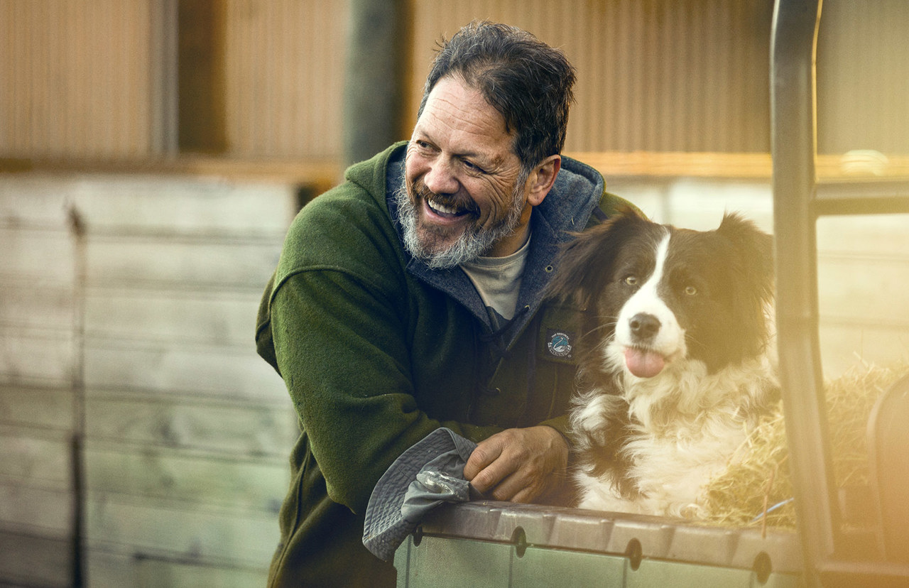 happy farmer with farm dog