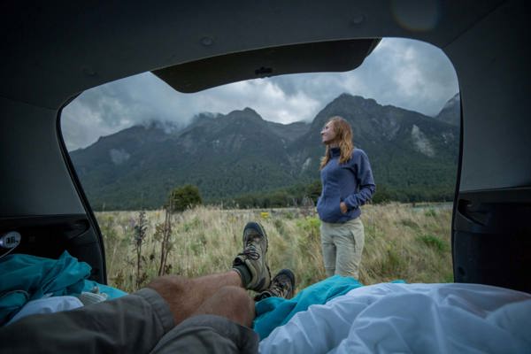 Couple camping in the mountains Couple camping in the mountains